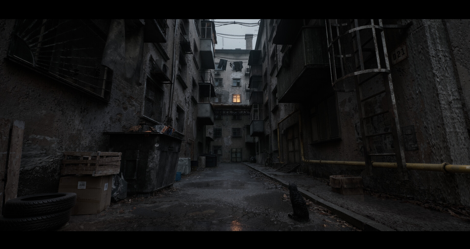 Dark wet alley between concrete blocks with yellow gas pipe and one lit window — full frame